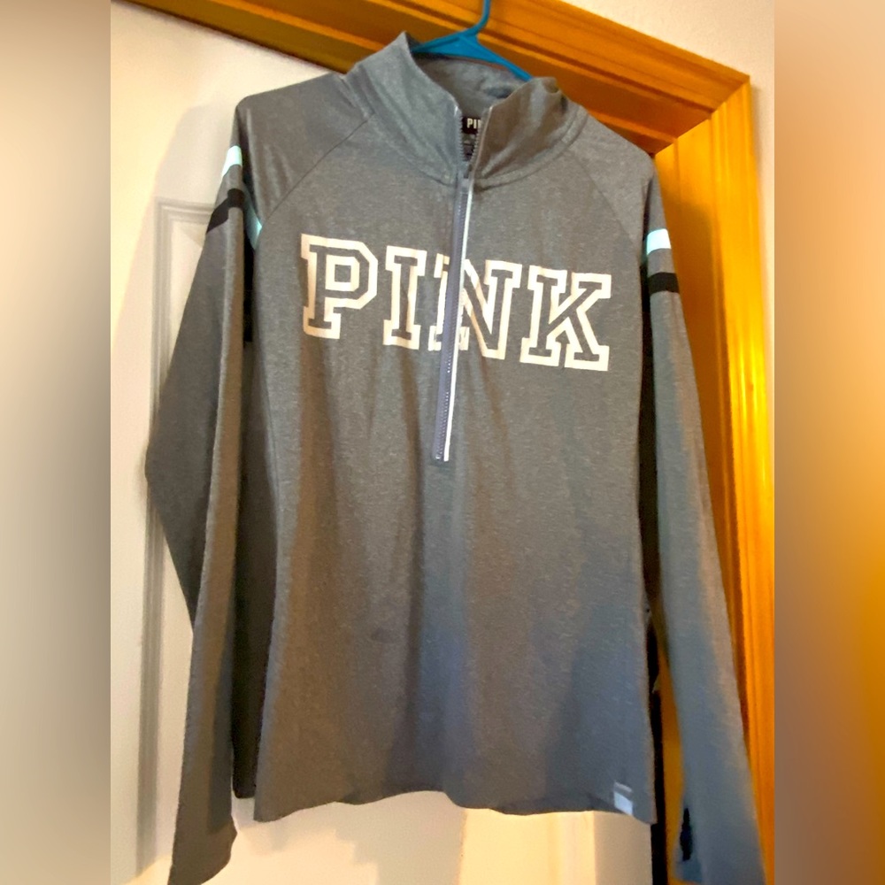 Pink 3/4 zip pull over.